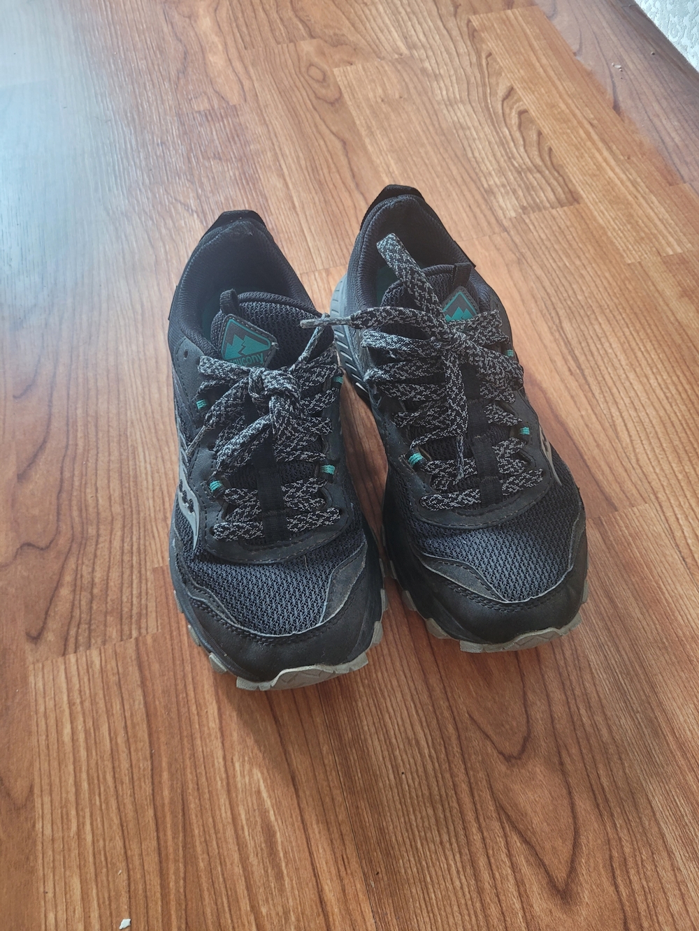 Saucony Black Athletic Running Shoes with Teal Accents